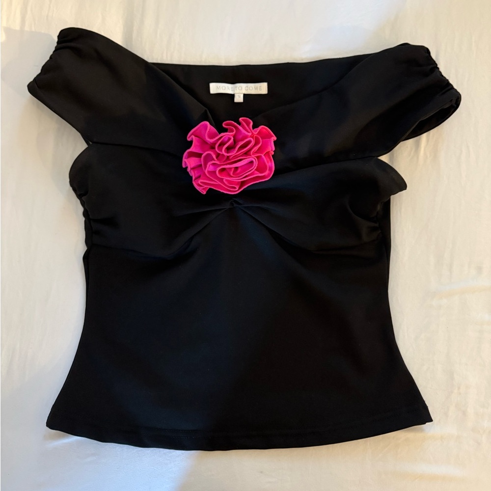 Elegant Black Top with Pink Floral Accent